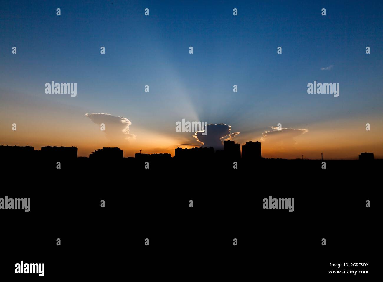A big city silhouette against the background of the evening sky ...