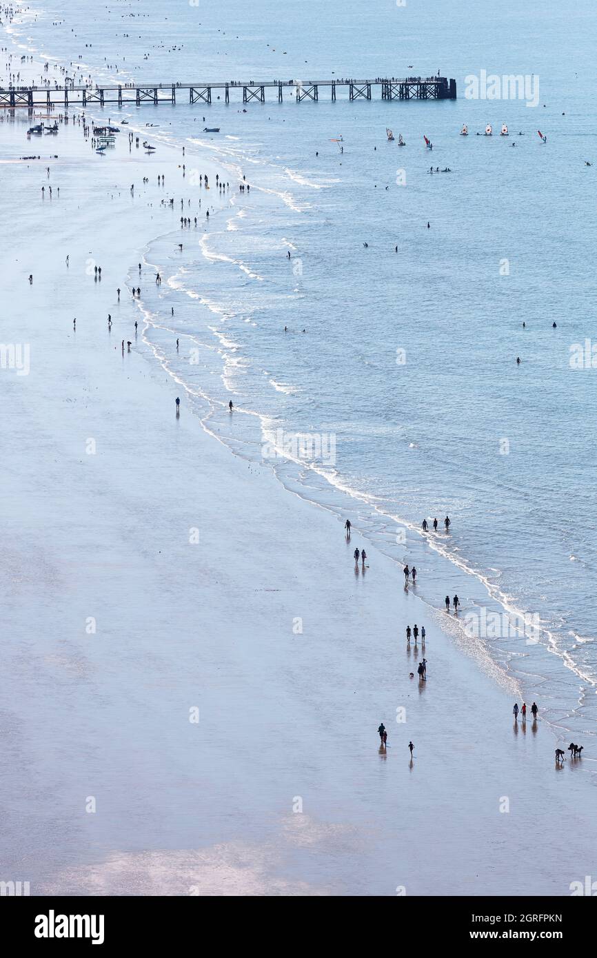 France, Vendee, St Jean de Monts, walkers and bathers on the beach and the jetty (aerial view) Stock Photo