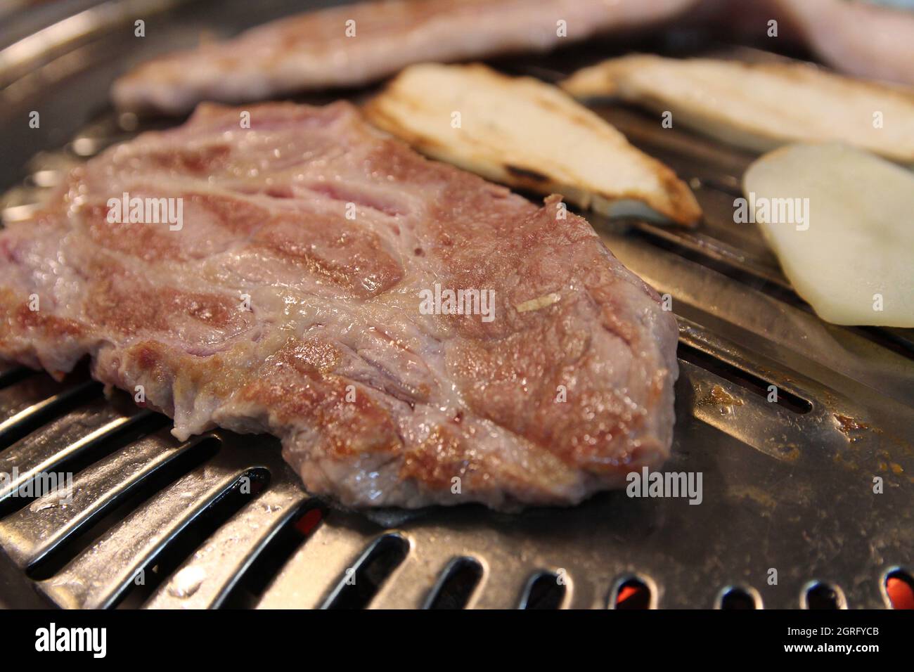 Korean Grilled Pork Bbq Or Samgyeopsalgui With Charcoal At Korean