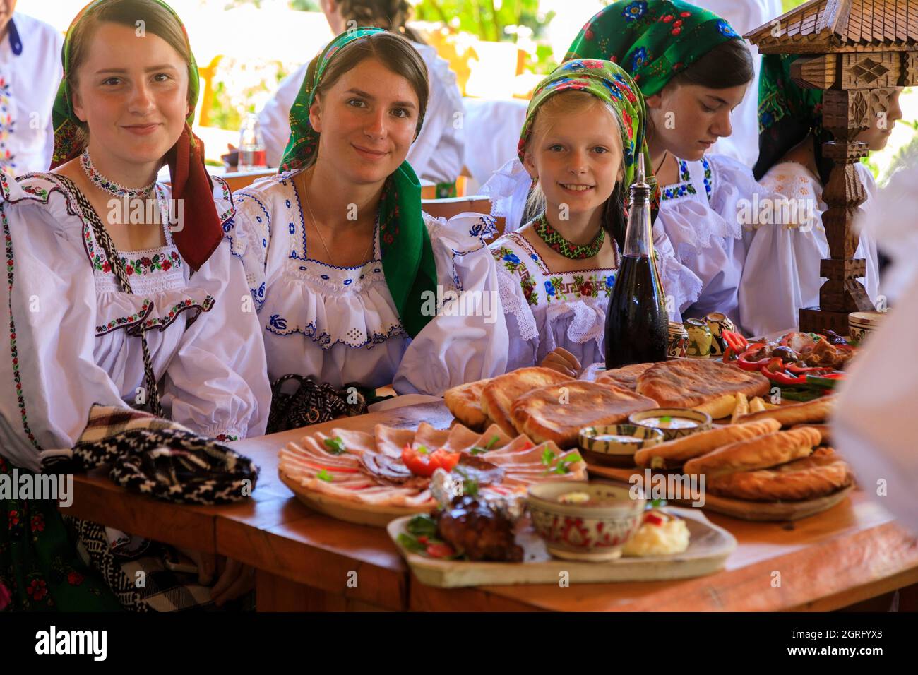 Romania, Maramures region, Petrova, Dacii Liberi hotel, traditional cuisine and costumes Stock
