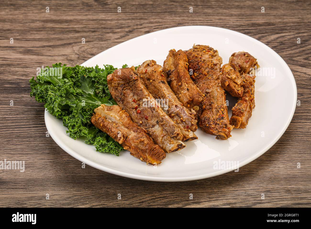Stewed pork ribs with spices and herbs Stock Photo - Alamy