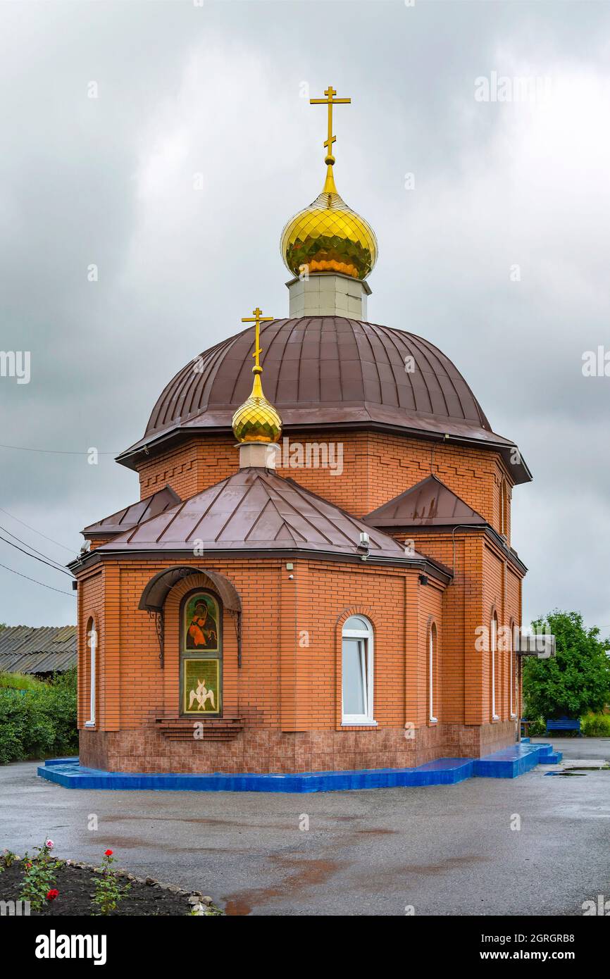 Orthodox Church of the Vladimir Icon of the Mother of God in the settlement of Trudoarmeyskiy, Kemerovo region-Kuzbass Stock Photo