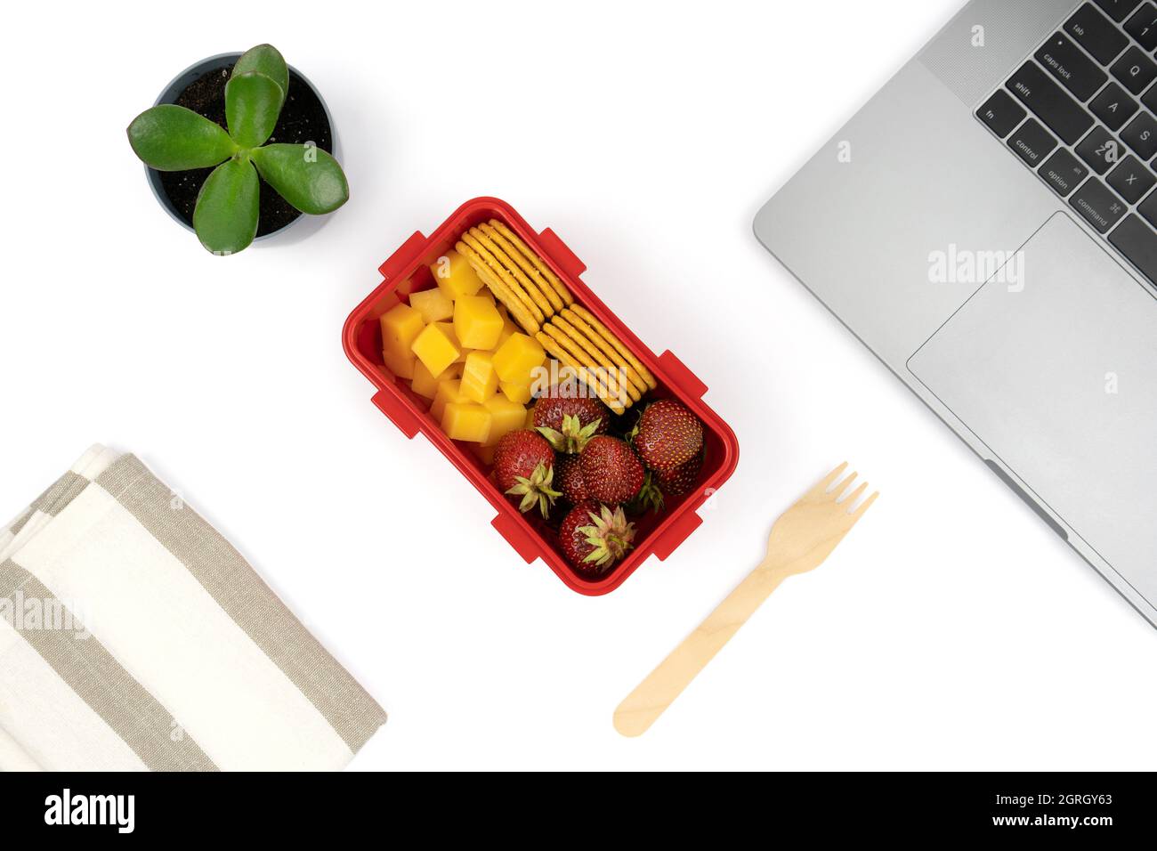 Healthy food in the workplace in the office. Vegan lunch box meal at