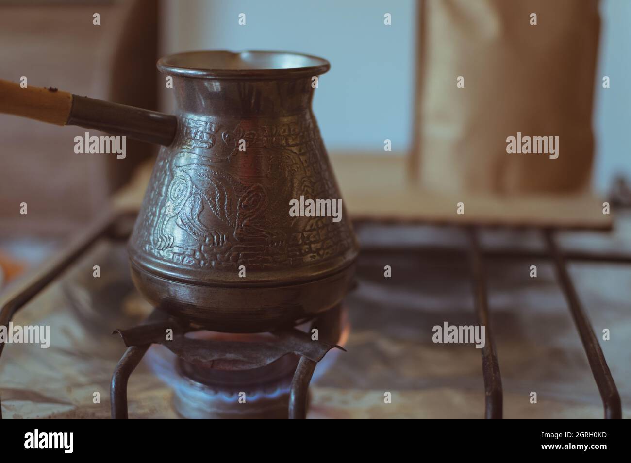 Turkish coffee pot on an open fire Stock Photo Alamy