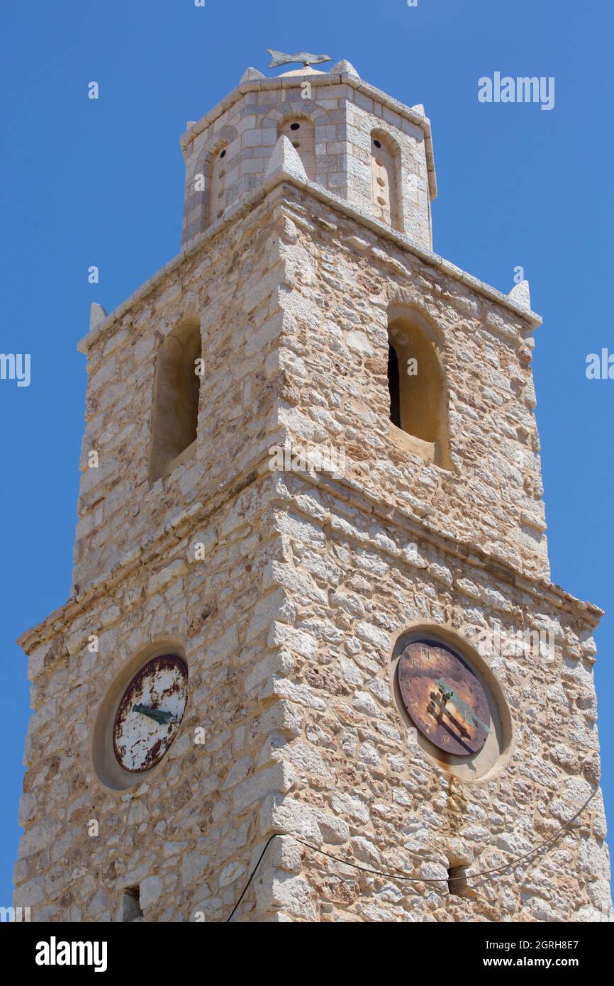 Bell and Clock Tower, Emborio Harbor, Halki (Chalki) Island, Dodecanese Group, Greece Stock Photo