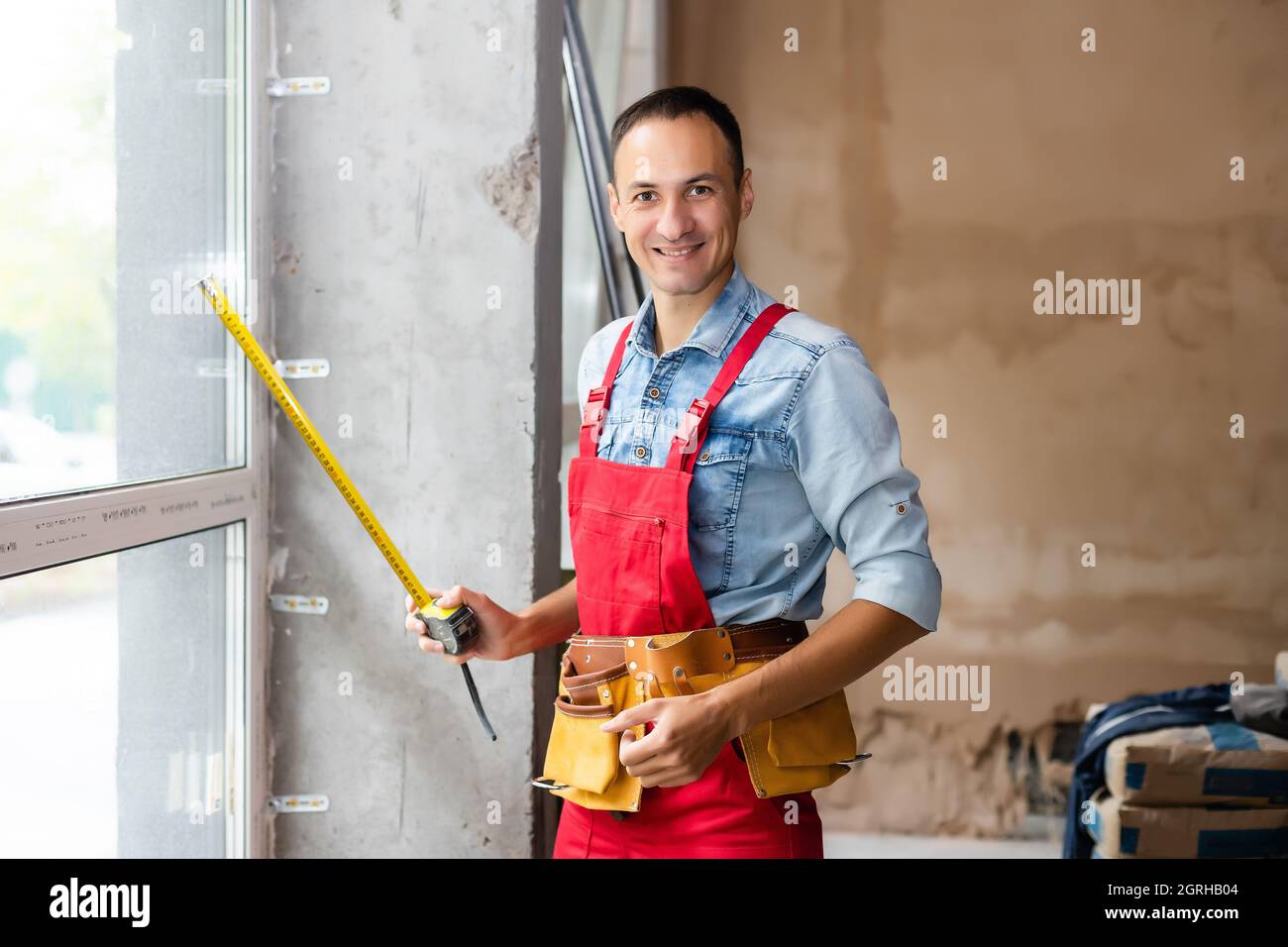 Young construction workers in a buiding Stock Photo