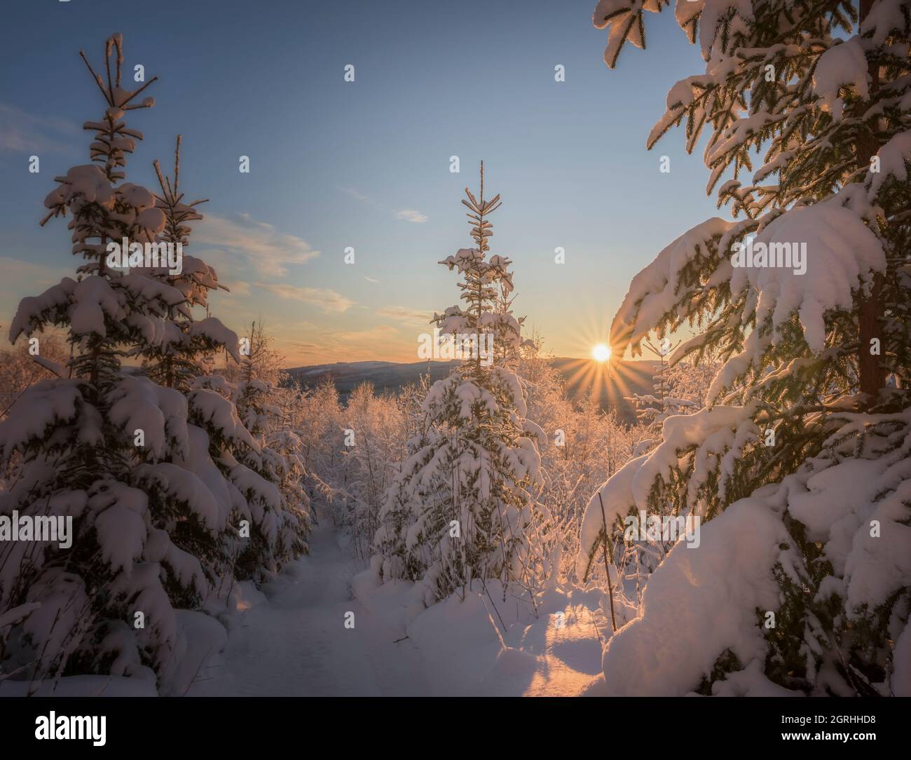 sundown in a winter mountain landscape Stock Photo