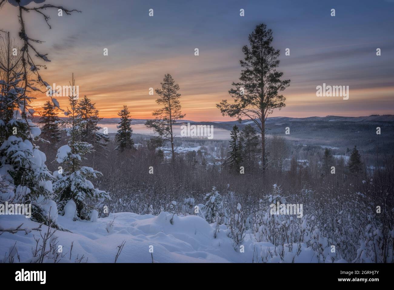 sunrise in a winter mountain landscape Stock Photo
