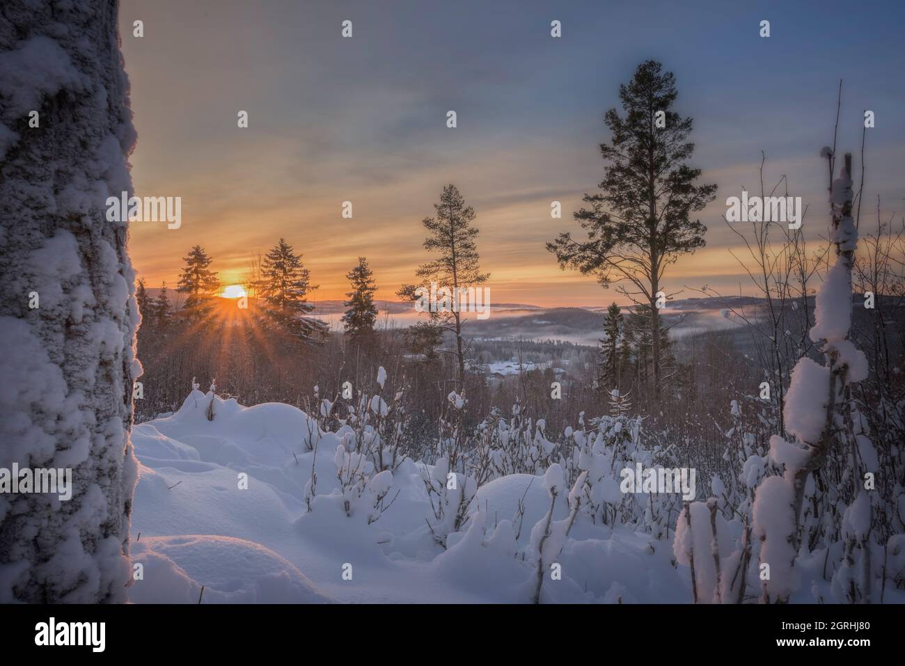 sunrise in a winter mountain landscape Stock Photo