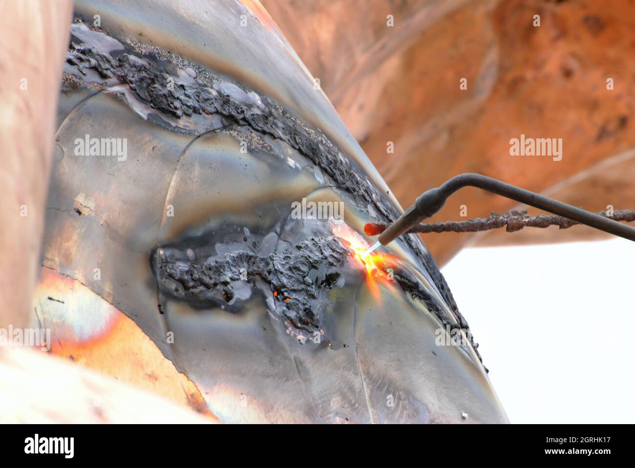 Welding At Bronze Statue Stock Photo Alamy