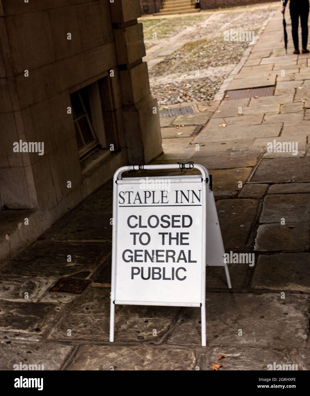 Staple Inn, Holborn, London; one of the Inns of Court housing barristers' chambers; a sign indicating that the Inn is closed to the public Stock Photo