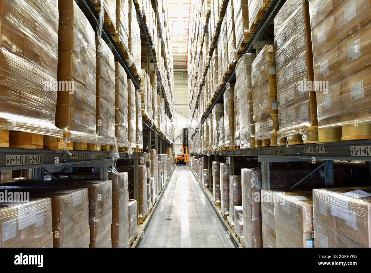 high-bay warehouse in an industrial company Stock Photo