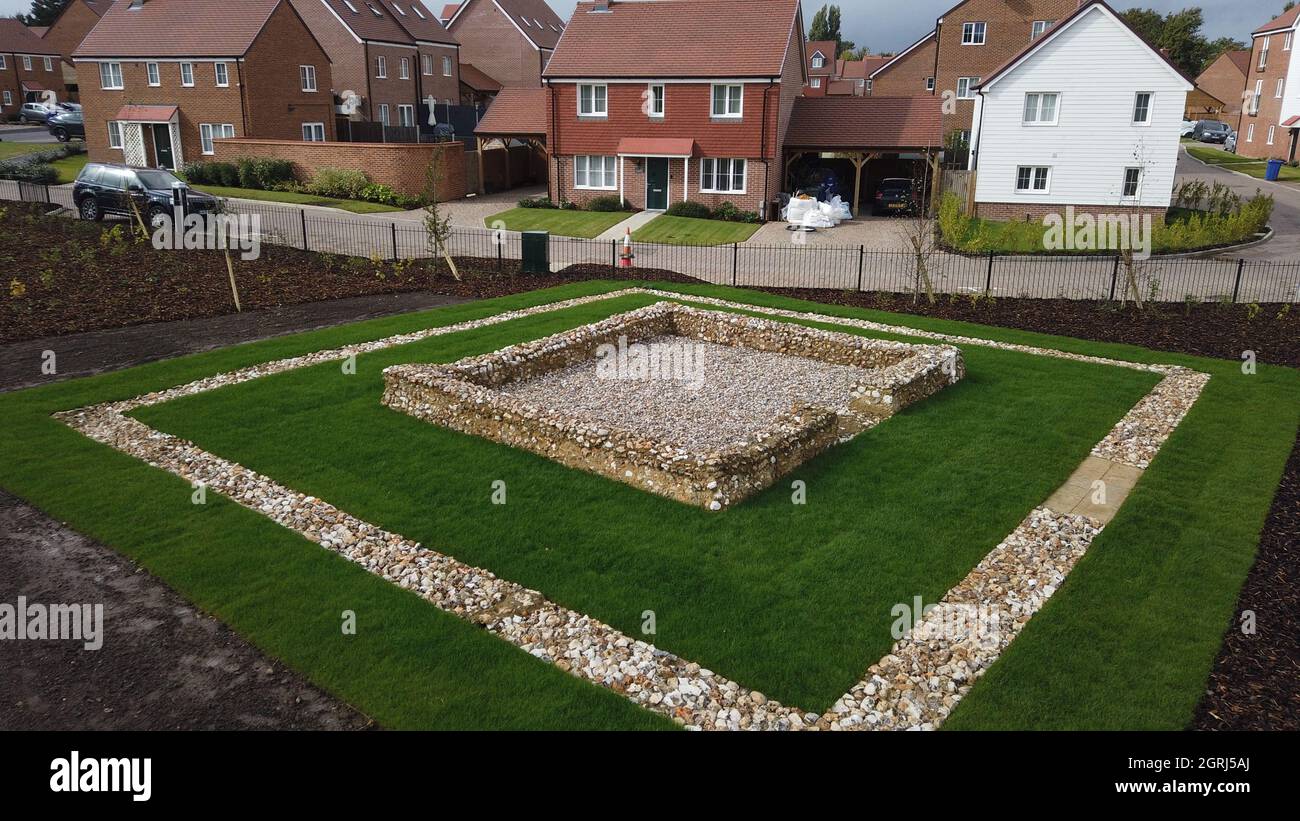 Sittingbourne, Kent, UK. 1st Oct, 2021. A 'new' 2000 yr old Roman Temple just off the busy A2 (thought to be a roman road) has been preserved in the village of Newington near Sittingbourne in Kent. Newington History Group have reconstructed the foundations they found during a dig on a new Persimmon homes housing estate. Persimmon gave the group land to reconstruct the foundations 70m from their original location so they could be preserved. The temple has been named 'Watling Place Temple'. Credit: James Bell/Alamy Live News Stock Photo