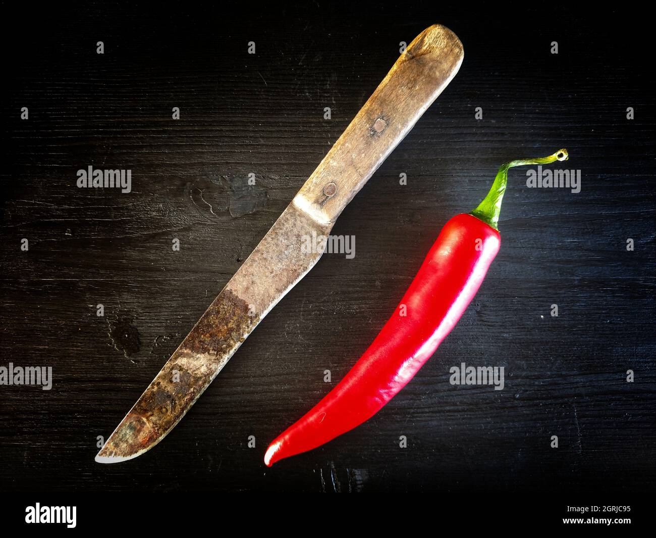 High Angle View Of Red Chili Peppers On Table Stock Photo