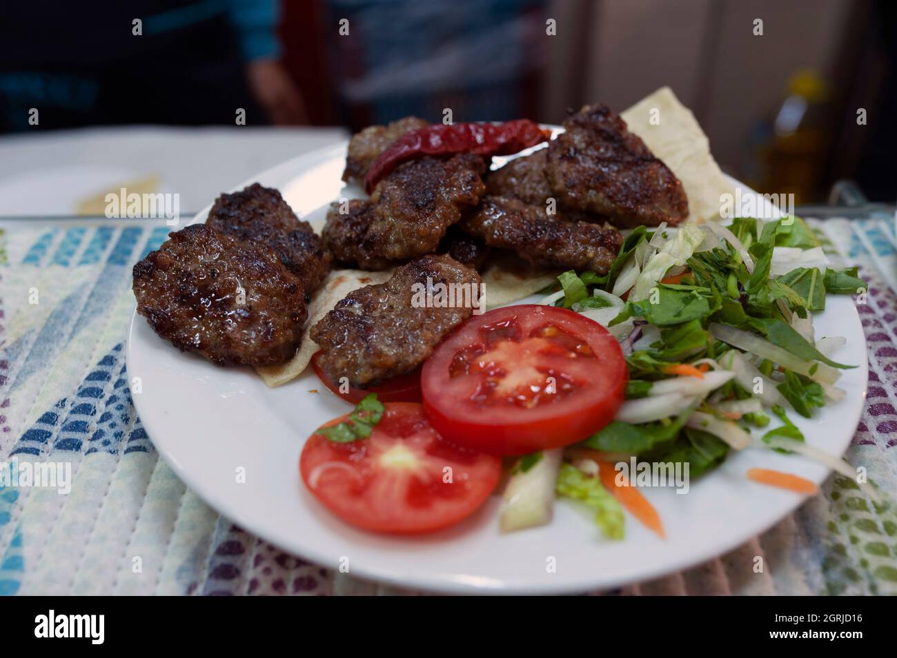 meatball bread, portion, meat dish, barbecue, fried meat, unhealthy diet, meatball, meatball between bread, meatball portion, restaurant Stock Photo