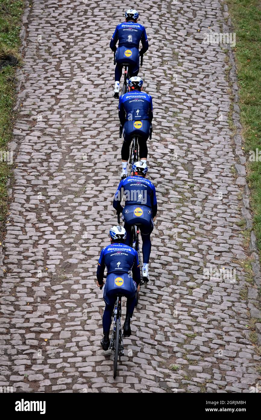 Deceuninck - Quick-Step riders pictured in action on a straight cobble ...