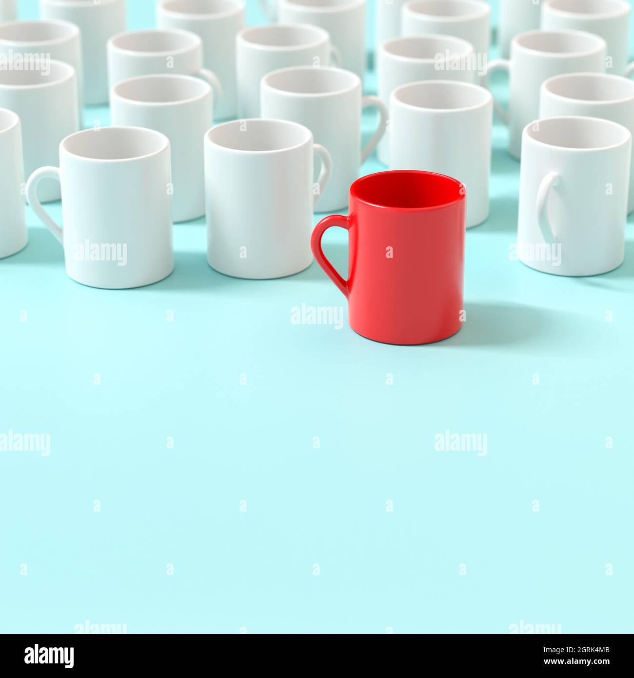 Standing out from the grey mass. Leadership concept. One red mug in front of white mugs. Stock Photo