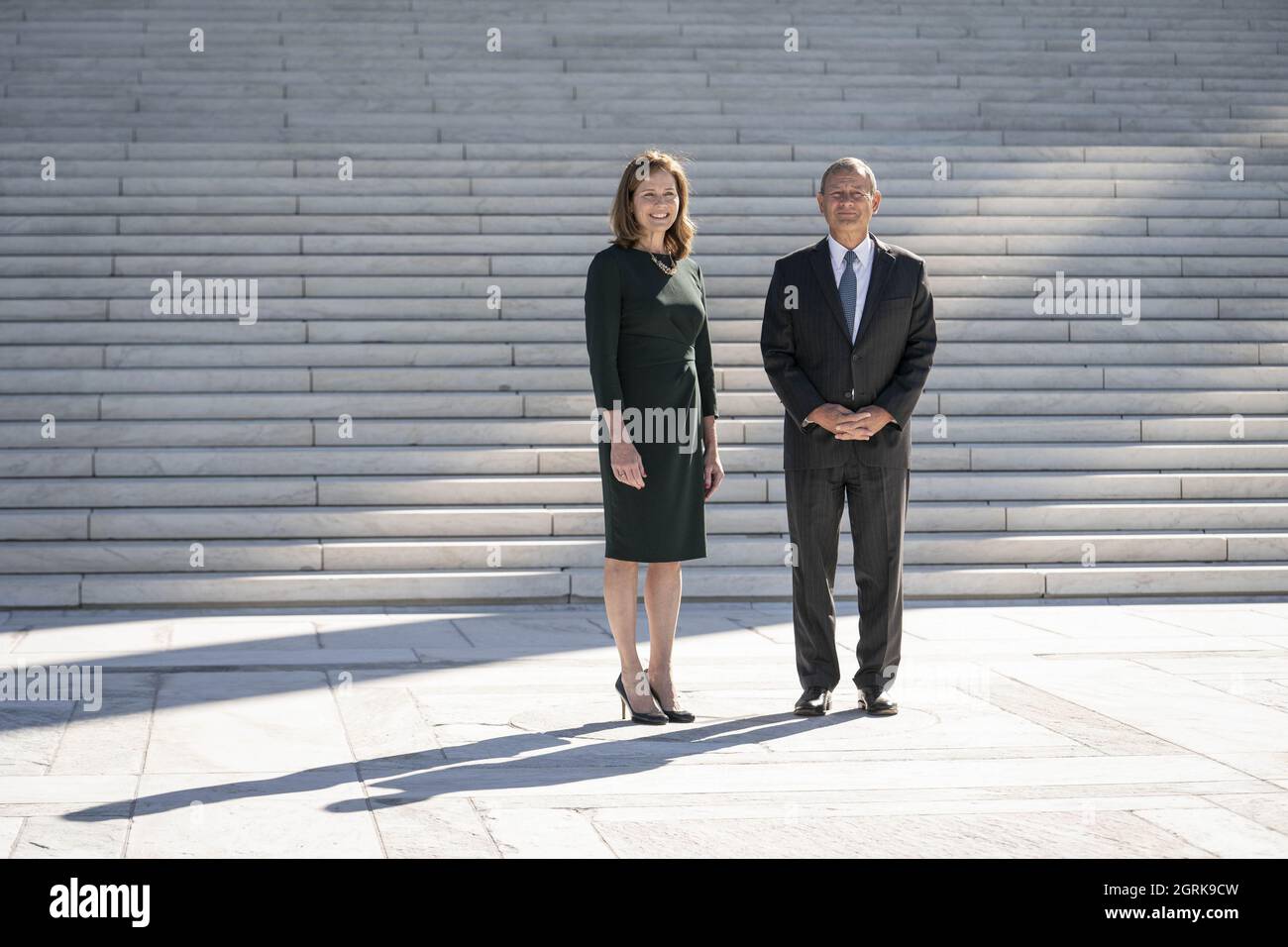 Washington, United States. 01st Oct, 2021. Supreme Court Justice Amy Coney Barrett and Chief Justice of the Supreme Court John Roberts participate in a photo-op outside of the Supreme Court of the United States following a investiture ceremony in Washington, DC on Friday October 1, 2021. Photo by Sarah Silbiger/UPI Credit: UPI/Alamy Live News Stock Photo
