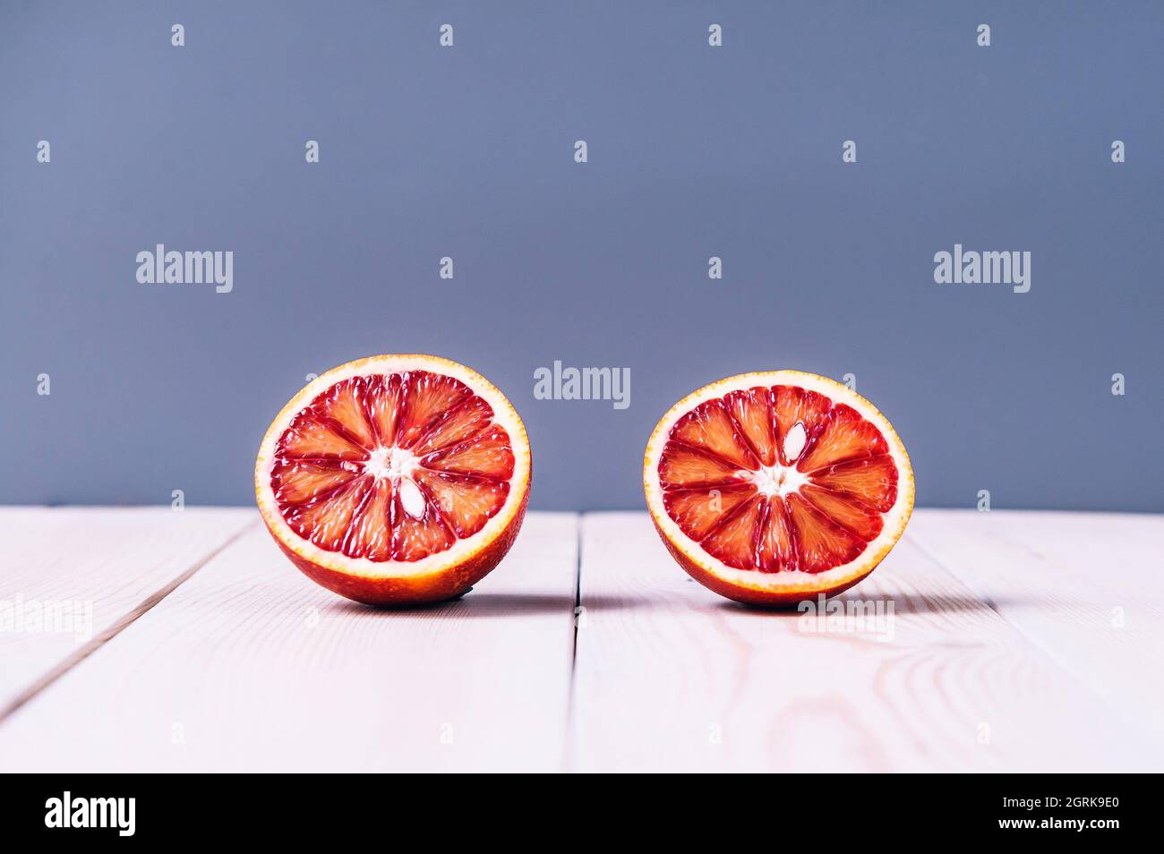 Close-up Of Oranges Fruits Against White Background Stock Photo