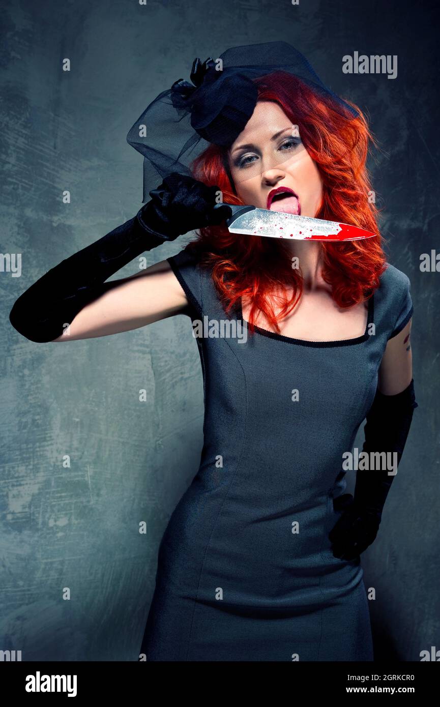 Licking blood hires stock photography and images Alamy