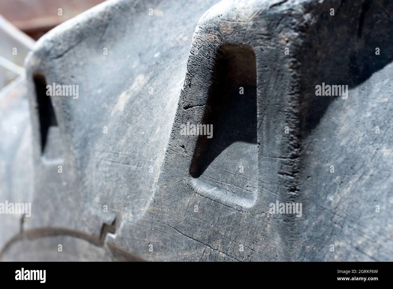 Old vehicle, scrap vehicle, worn tire, backhoe loader Stock Photo