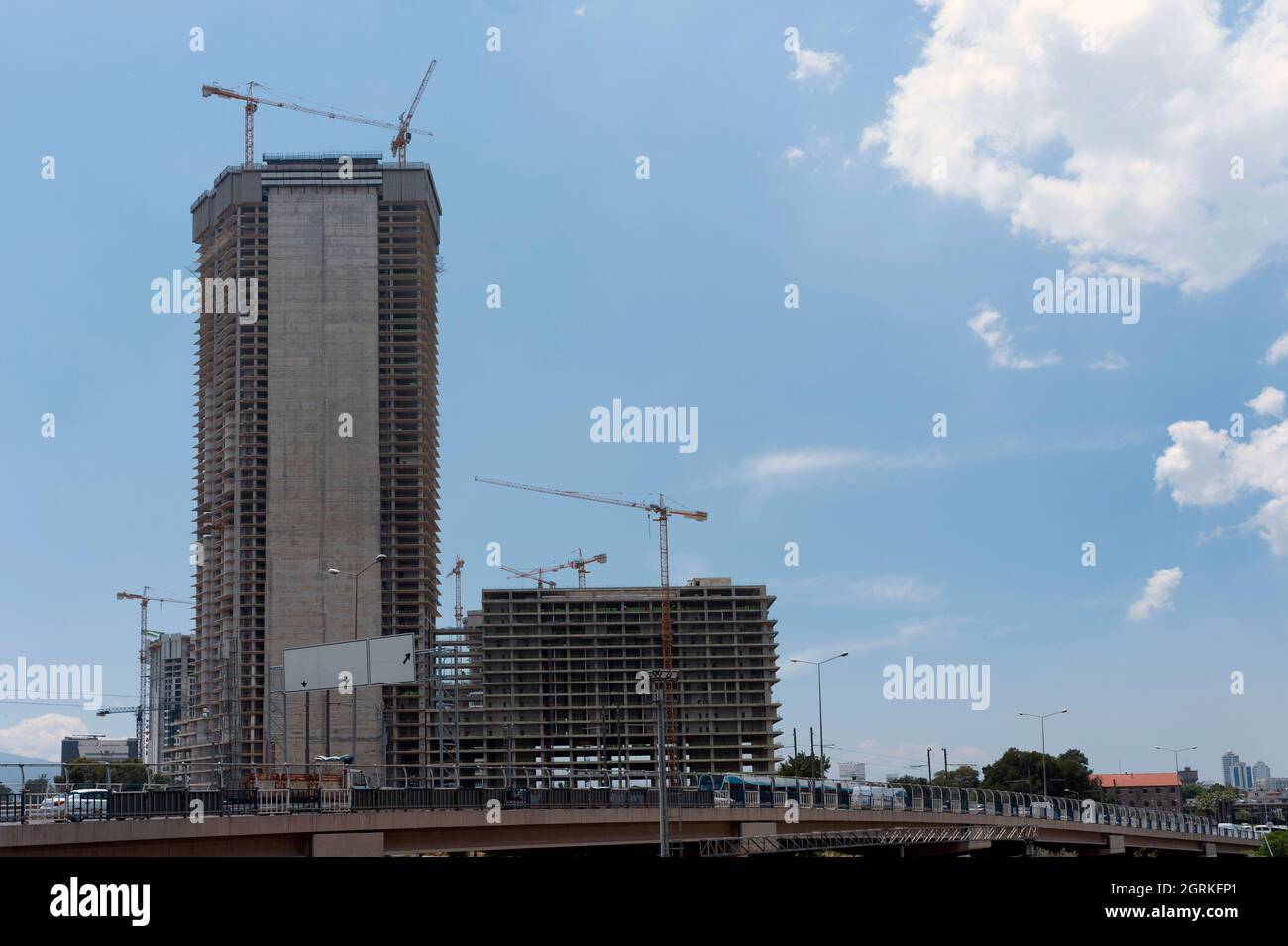 Tall building under construction in the city Stock Photo