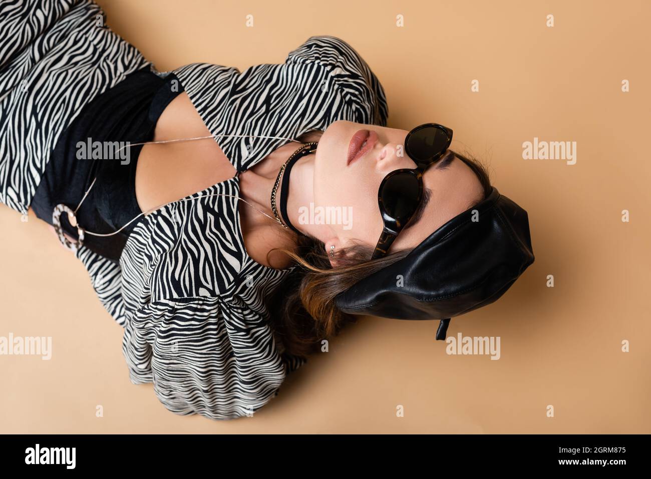 Young woman beret sunglasses in hi-res stock photography and images - Alamy