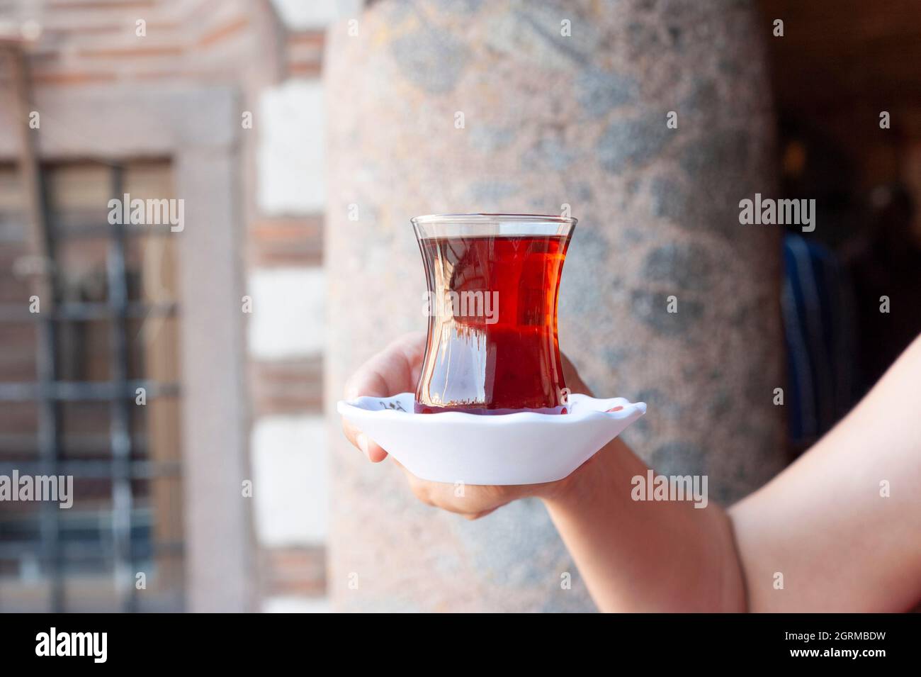 Turkish tea, cup of tea, holding glass tea, hot drink Stock Photo