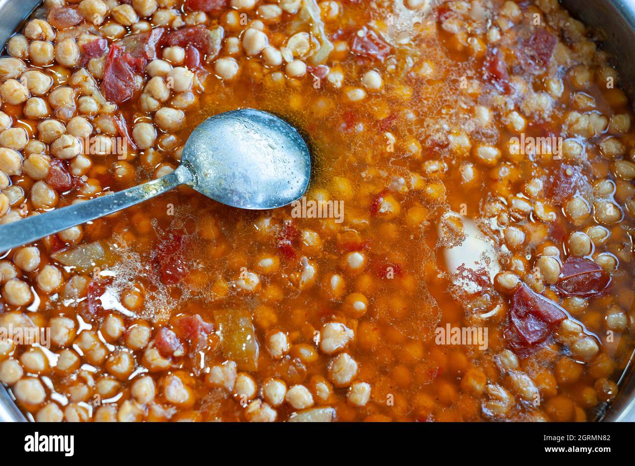 Spicy chickpeas with tomato paste Stock Photo Alamy