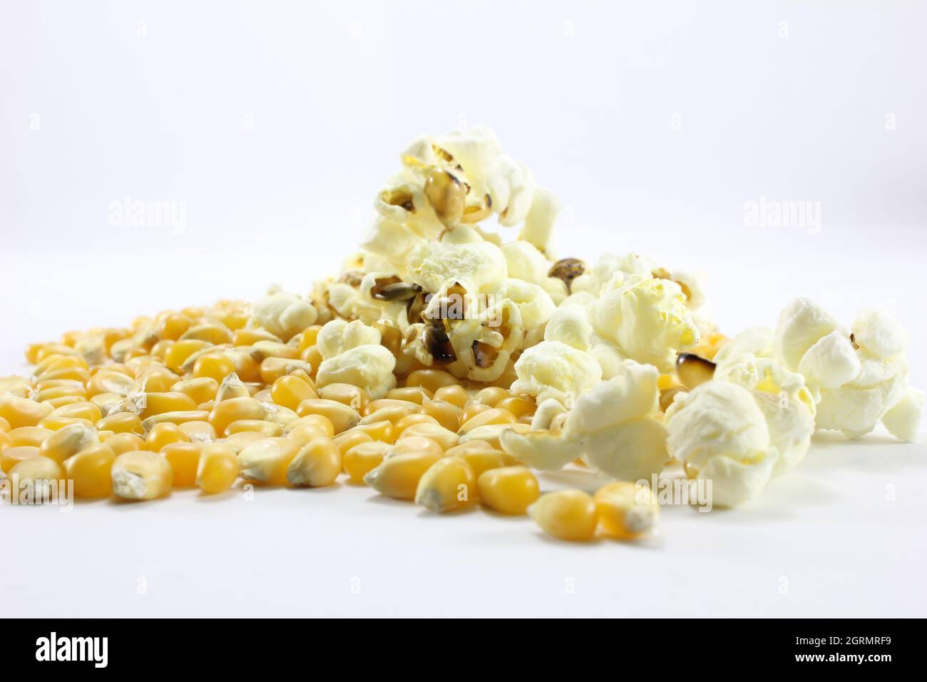 Corn Kernels For Making Popcorn On A White Background Stock Photo Alamy