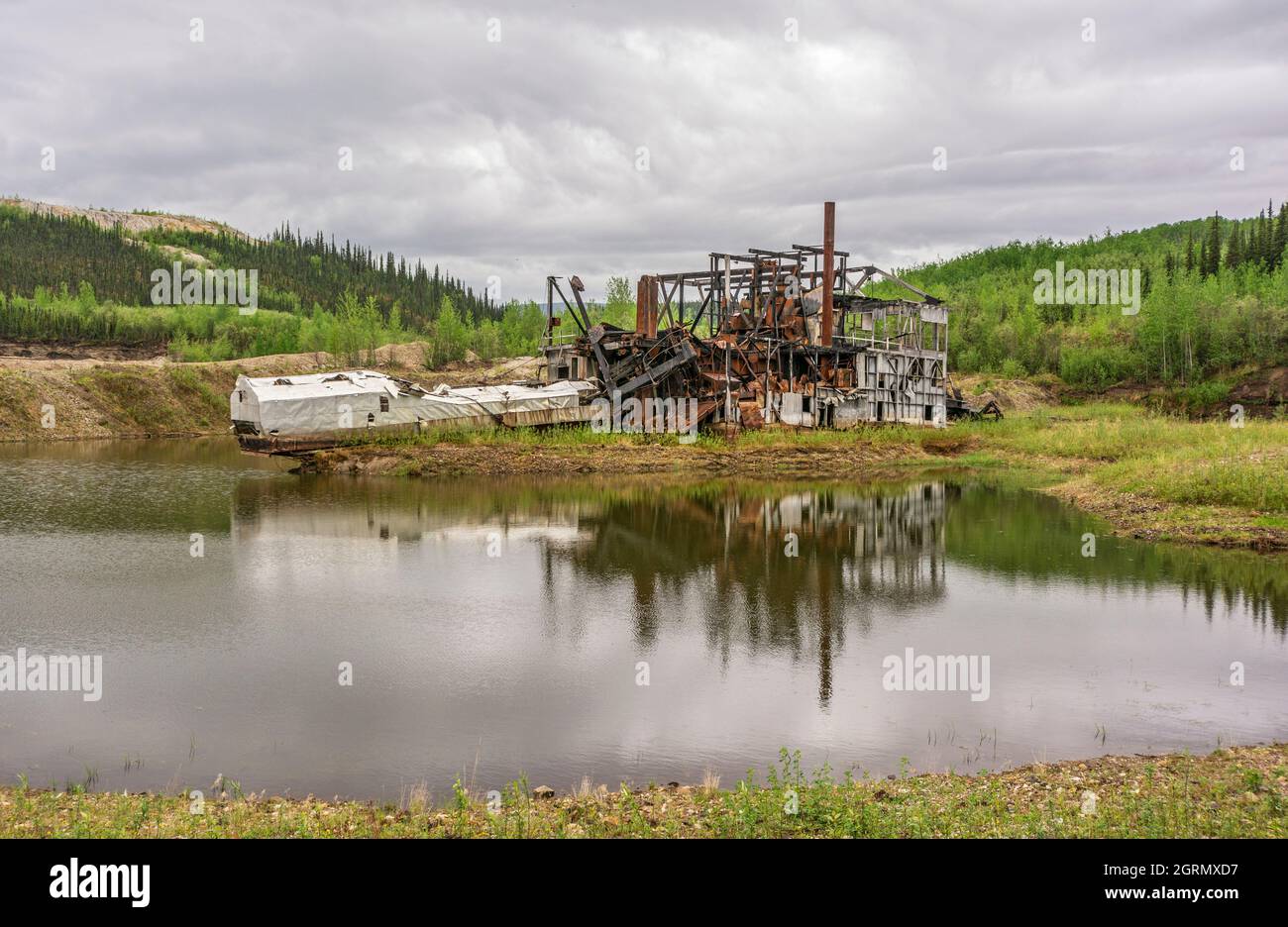 Canada, Yukon Territory, Klondike Region, gold mining dredge ruin Stock Photo
