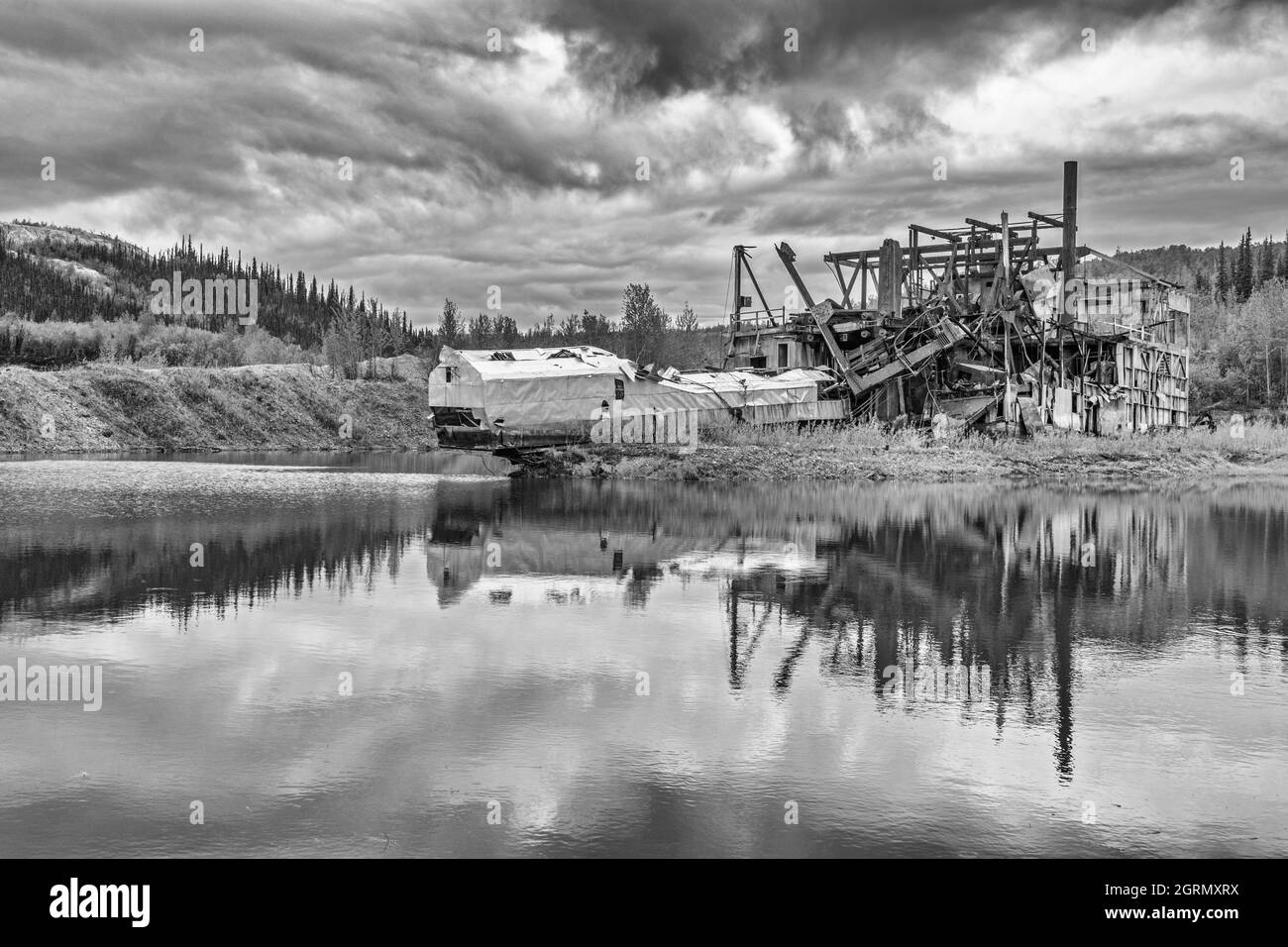 Canada, Yukon Territory, Klondike Region, gold mining dredge ruin, monochrome Stock Photo