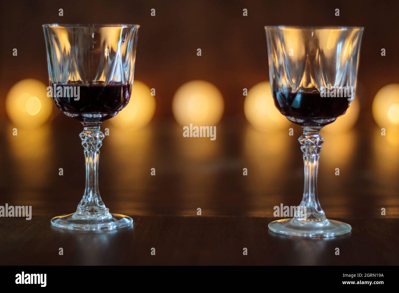 Night lights glass of wine atmospheric hires stock photography and
