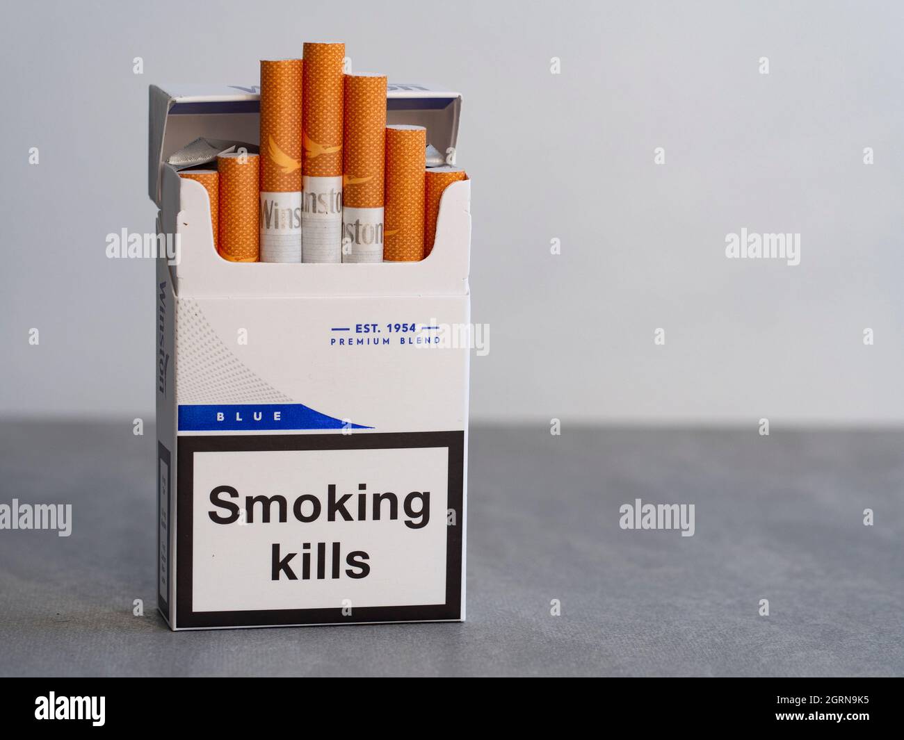 In this photo illustration, a pack of Vinston Blue Cigarettes, made by  Japan Tobacco (Outside the U.S.) with a government warning 'Smoking Kills'  seen displayed Stock Photo - Alamy