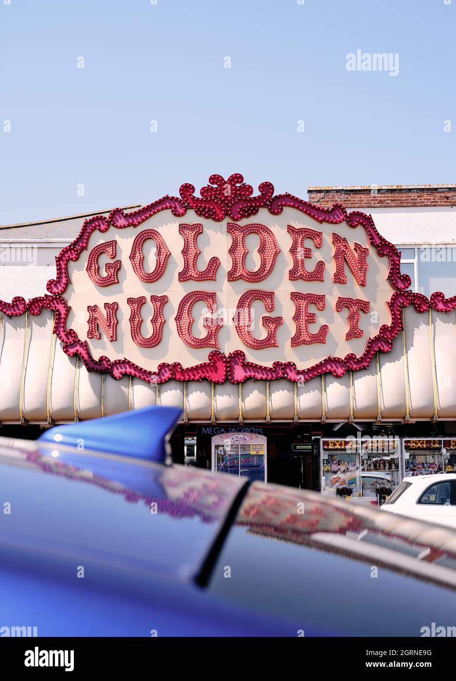 The Golden Nugget amusement arcade colourful seafront architecture of Marine Parade Great Yarmouth seaside resort town on the Norfolk coast England. Stock Photo