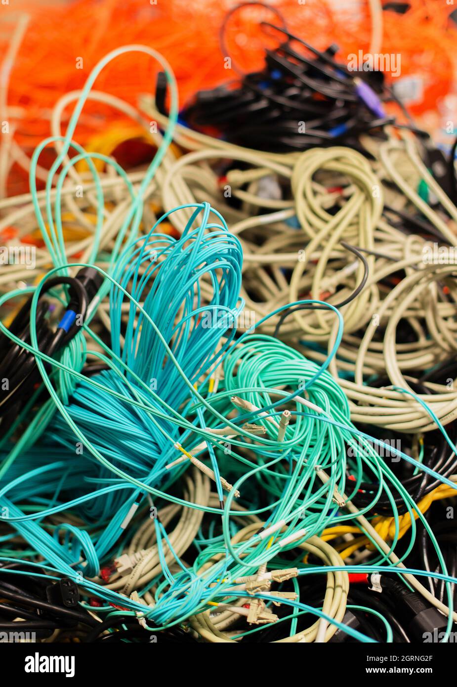 Old Network Cables And Power Cables In A Pile For Disposal Stock Photo