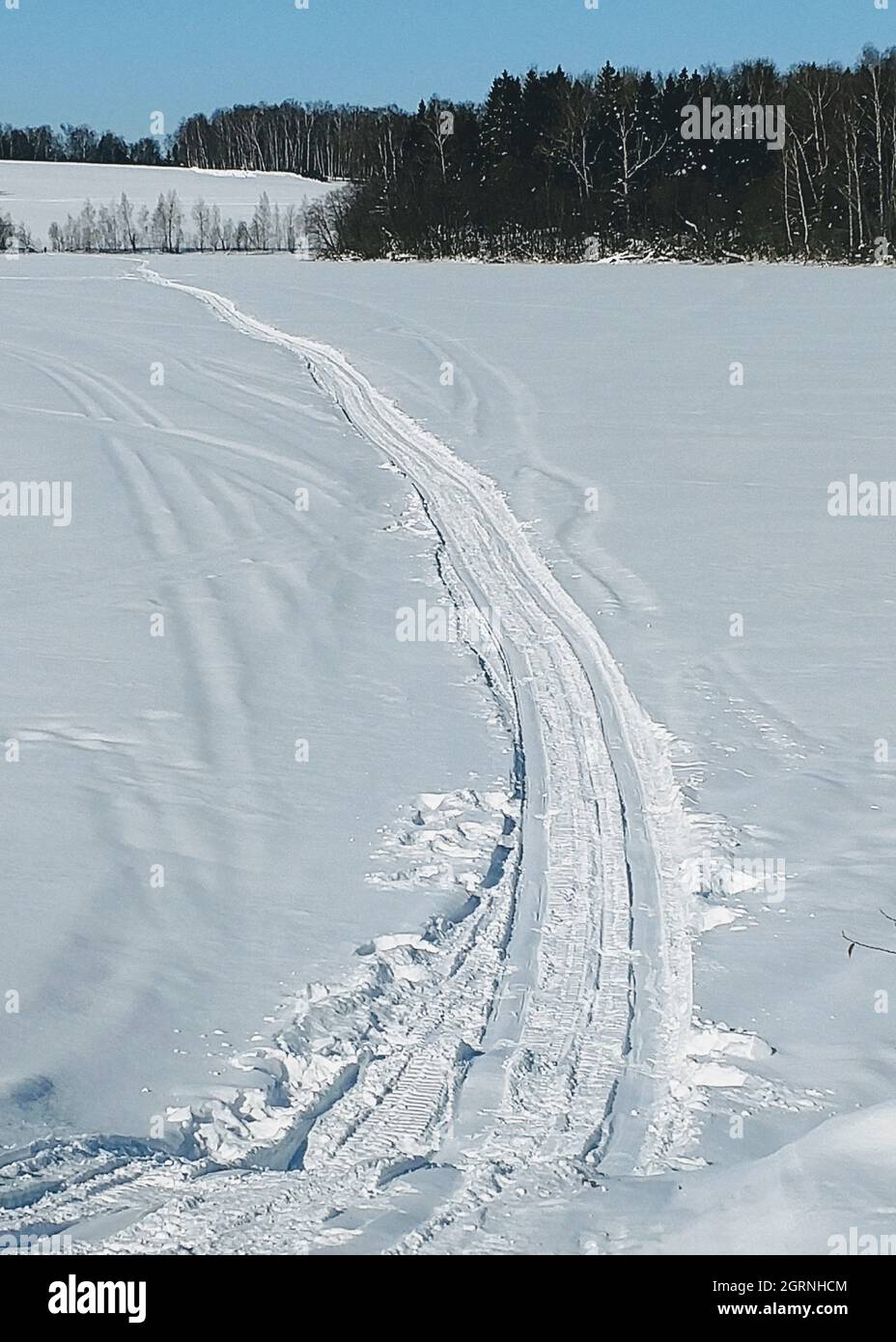 Scenic View Of Snow Field During Winter Stock Photo