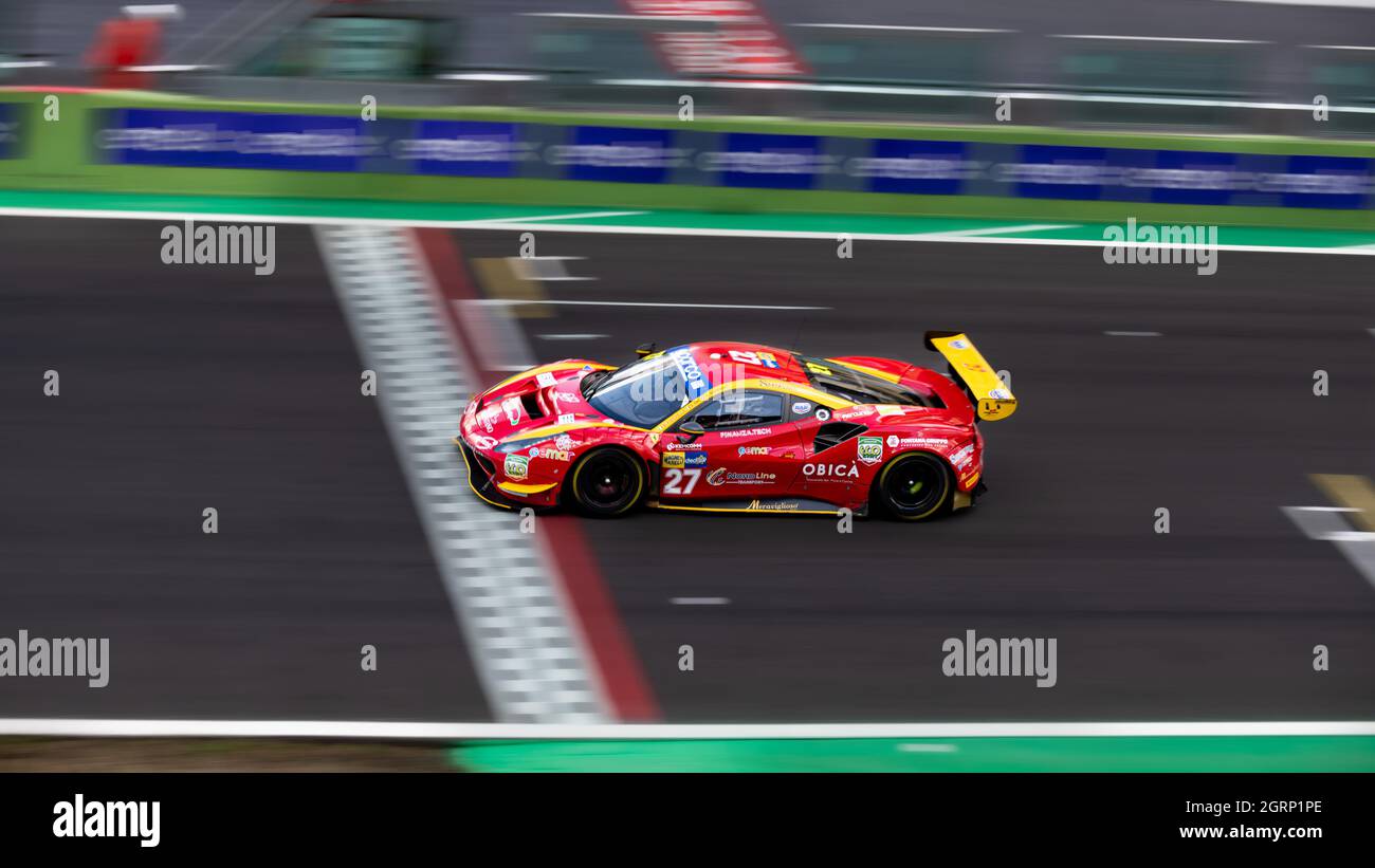 Vallelunga, italy september 18th 2021 Aci racing weekend. Fast Ferrari 488 gt on asphalt race track spectacular high angle view Stock Photo