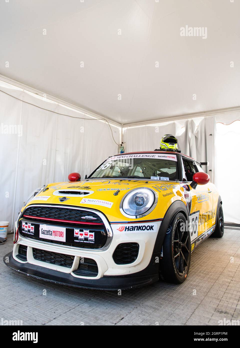 Vallelunga, italy september 18th 2021 Aci racing weekend. Mini Cooper race car competition standing in motorsport showroom no people front view Stock Photo