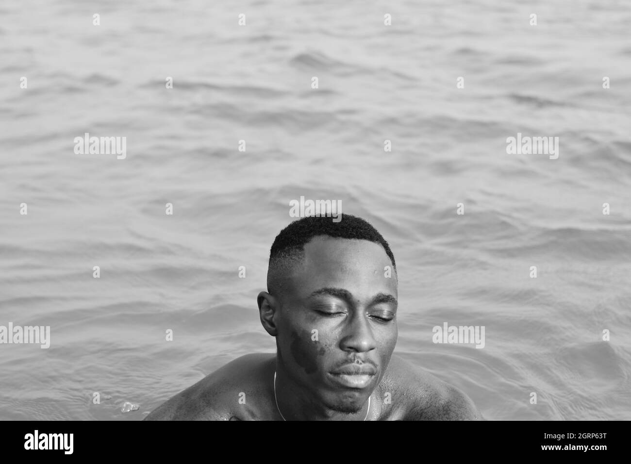 two boys swimming in the ocean Stock Photo Alamy