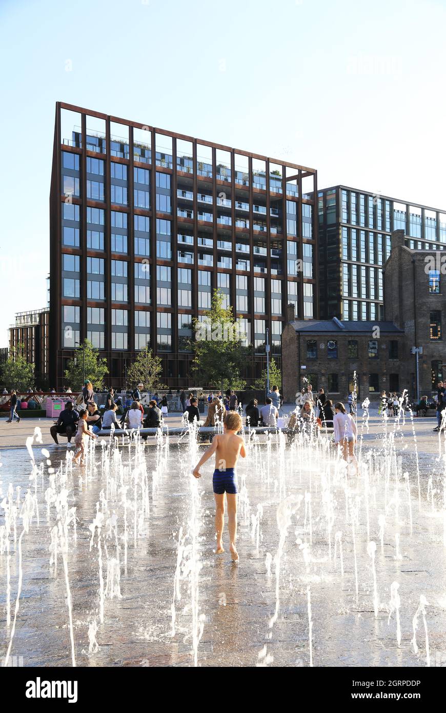 Autumn sunshine on the fountains in Granary Square, at Kings Cross, in