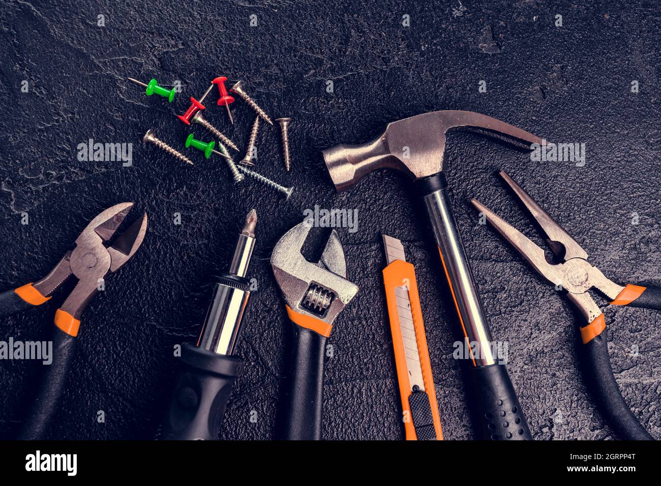 Many different tools for repair work on a black background Stock Photo