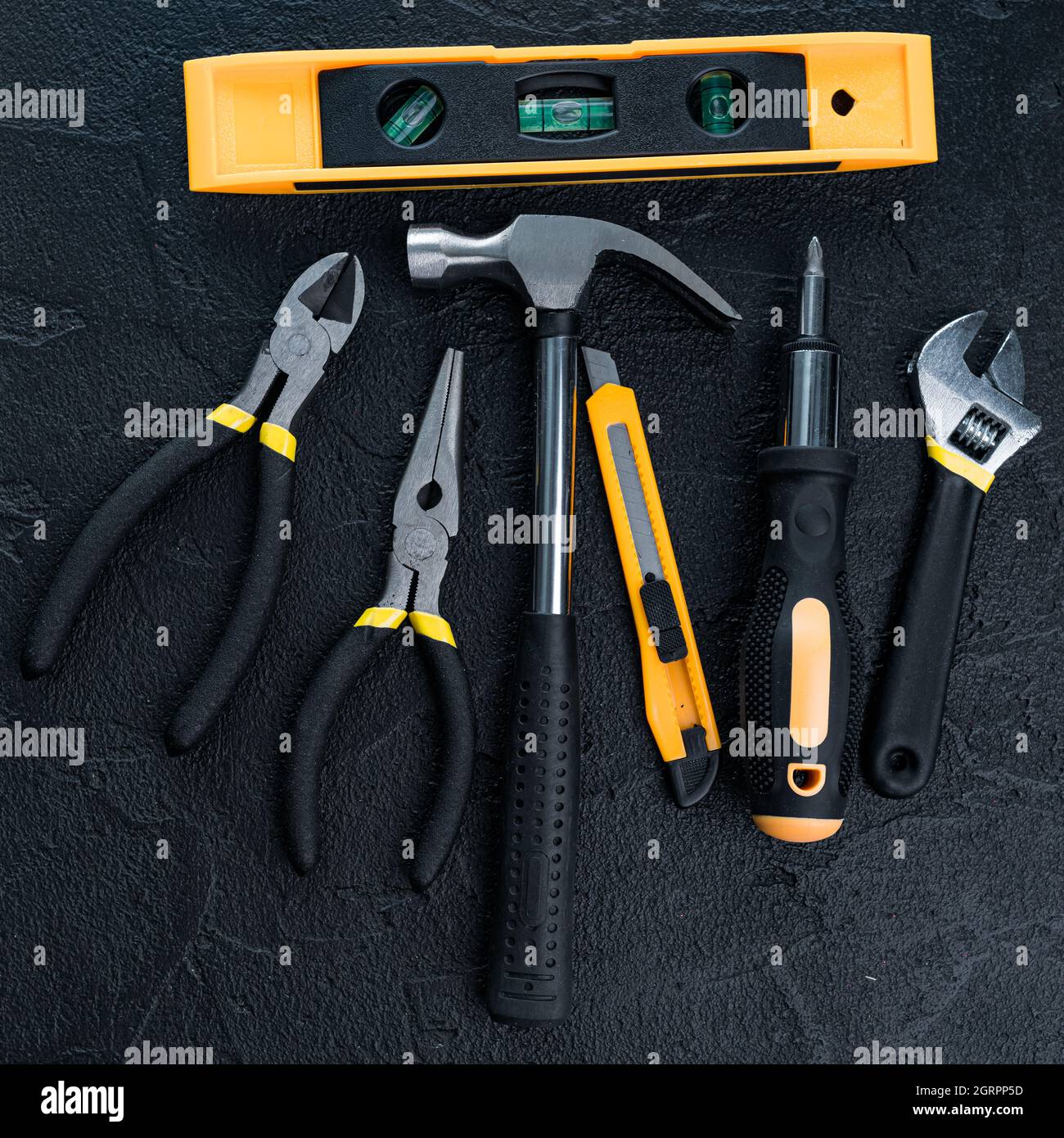 Many different tools for repair work on a black background Stock Photo