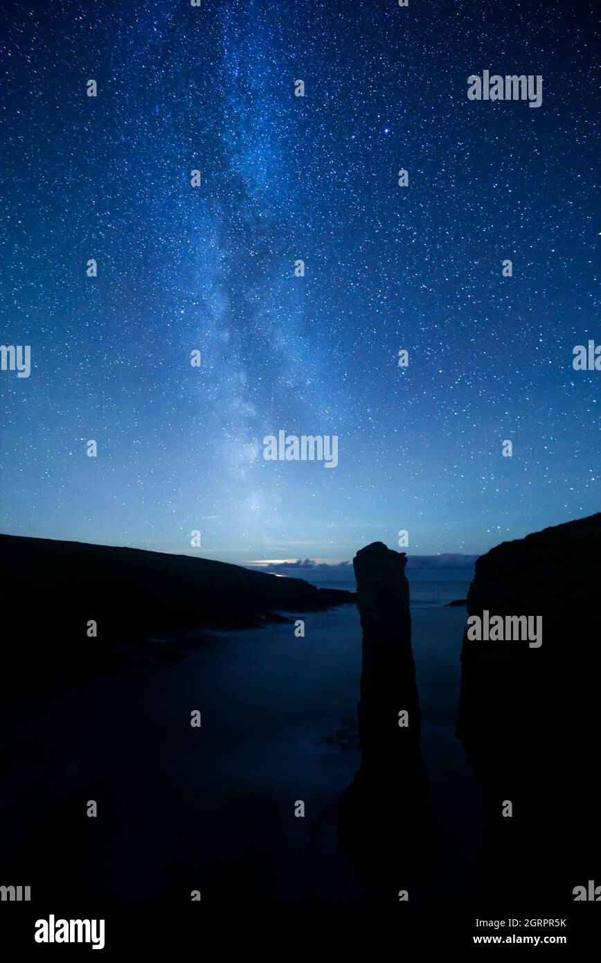 Milky Way in night sky, Yesnaby, Orkney Isles Stock Photo