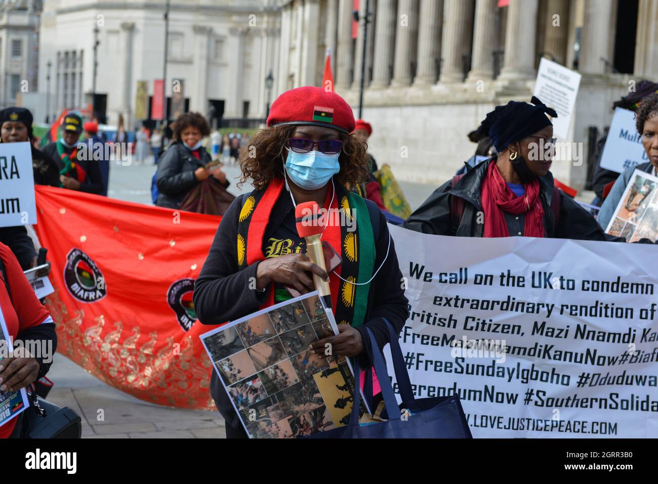 A protester holds a placard during the demonstration. People of Biafra (Eastern part of Nigeria) and The Indigenous People of Biafra, gathered at Trafalgar Square, and marched to Downing Street demanding the referendum to be conducted in Nigeria for peaceful separation of Biafra from Nigeria. Stock Photo
