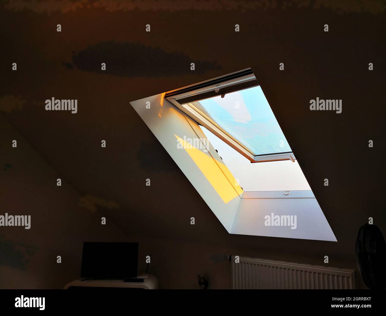 Low Angle View Of Open Ceiling Window At Home Stock Photo