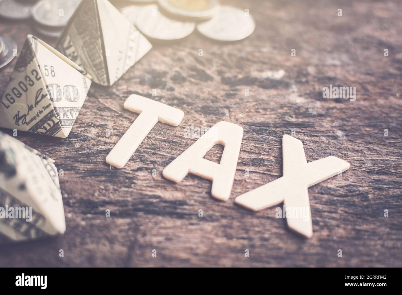 High Angle View Of Tax Text On Wooden Table Stock Photo
