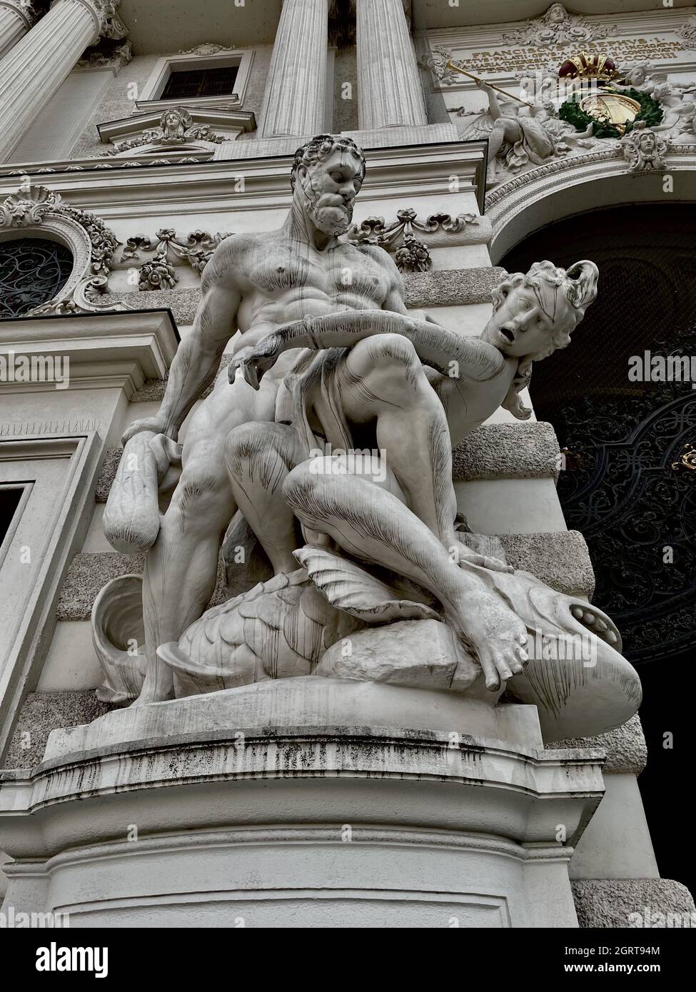 The sculpture of Hercules capturing a foe at the Hofburg Imperial Palace, Vienna, Austria Stock Photo