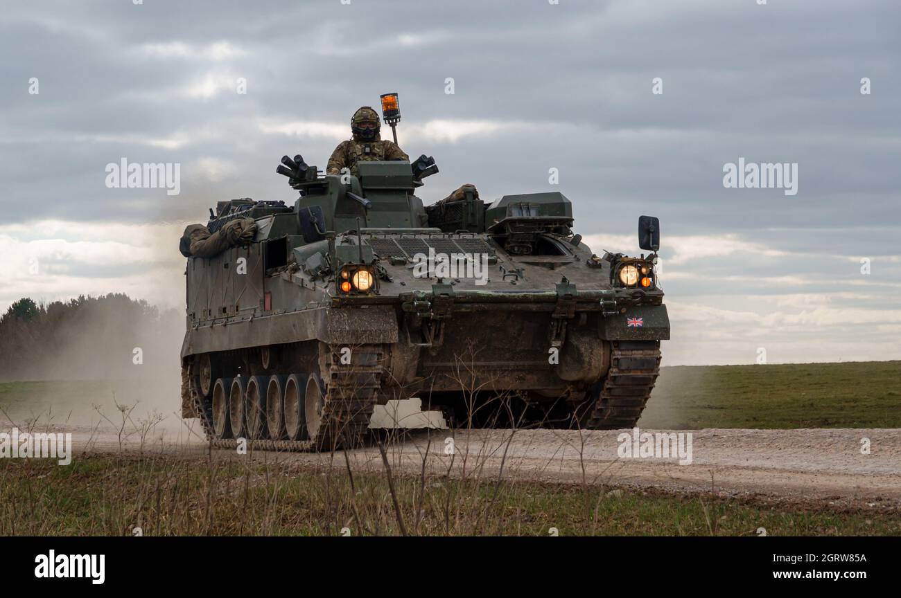 British army Warrior FV512 mechanized recovery vehicle REME in action on a military exercise Wiltshire UK Stock Photo