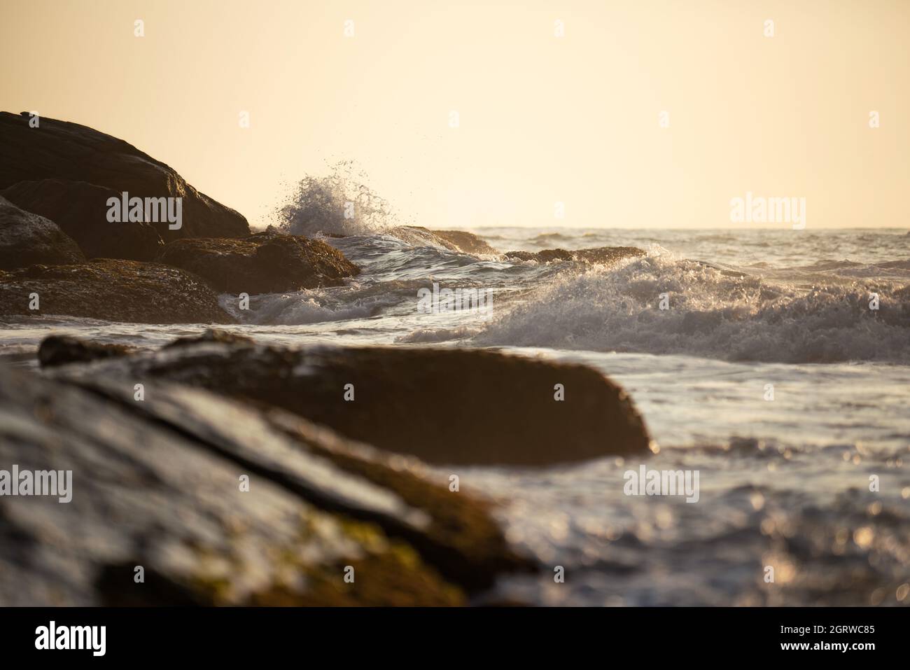 Beautiful waves on sandy beach hi-res stock photography and images - Alamy